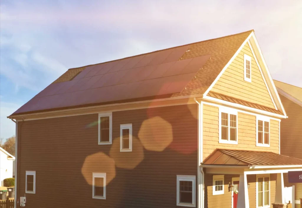 a house with solar panels in warm sunlight